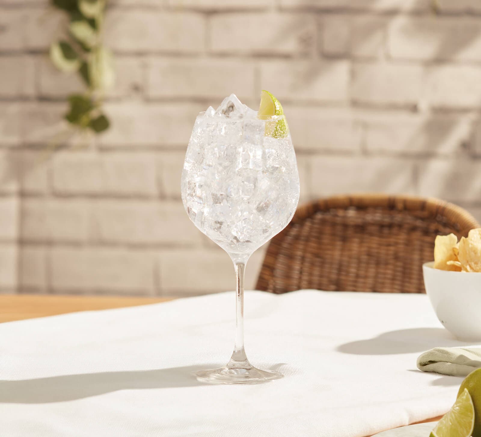 A gin and tonic on a table.
