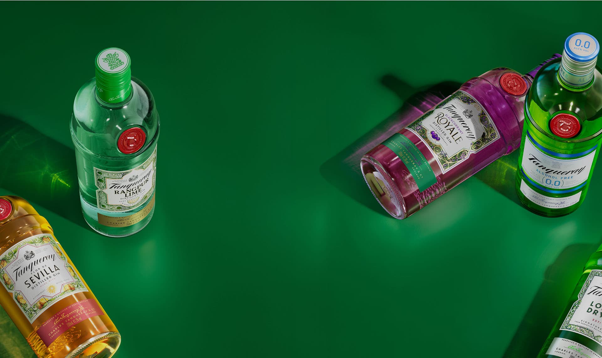 Five different Tanqueray bottles.